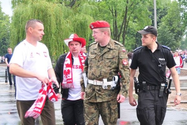 A joint patrol of a Polish MP and Police officer. An MP by himself can not stop a civilian unless he is in the middle of committing a dangerous crime so they sometimes are seen in joint patrols with police officers.